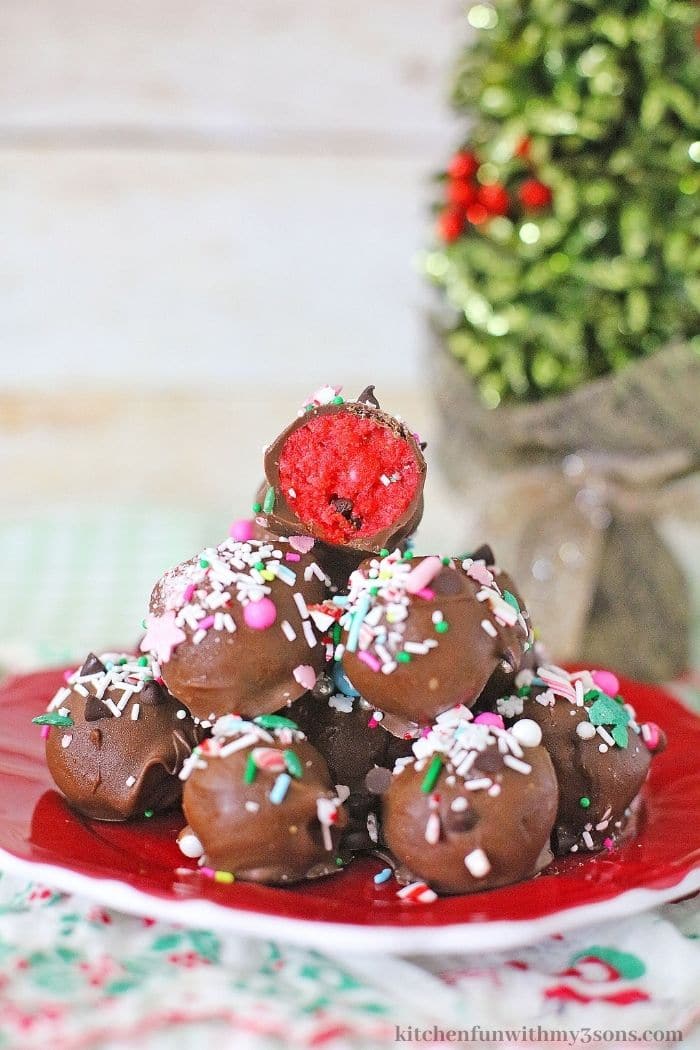 A pile of truffles topped with crushed peppermint.