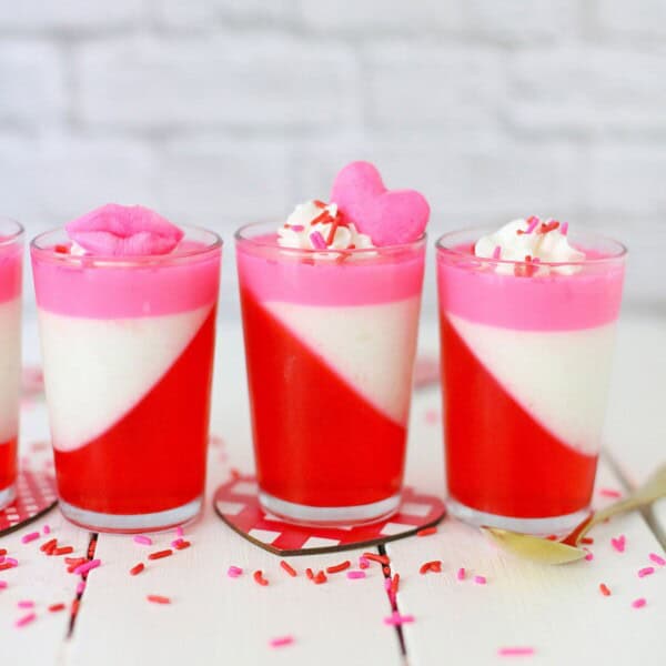 The parfaits surrounded by crushed peppermint.