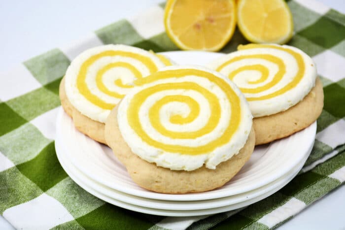 Three lemon Bar Cookies on a plate.