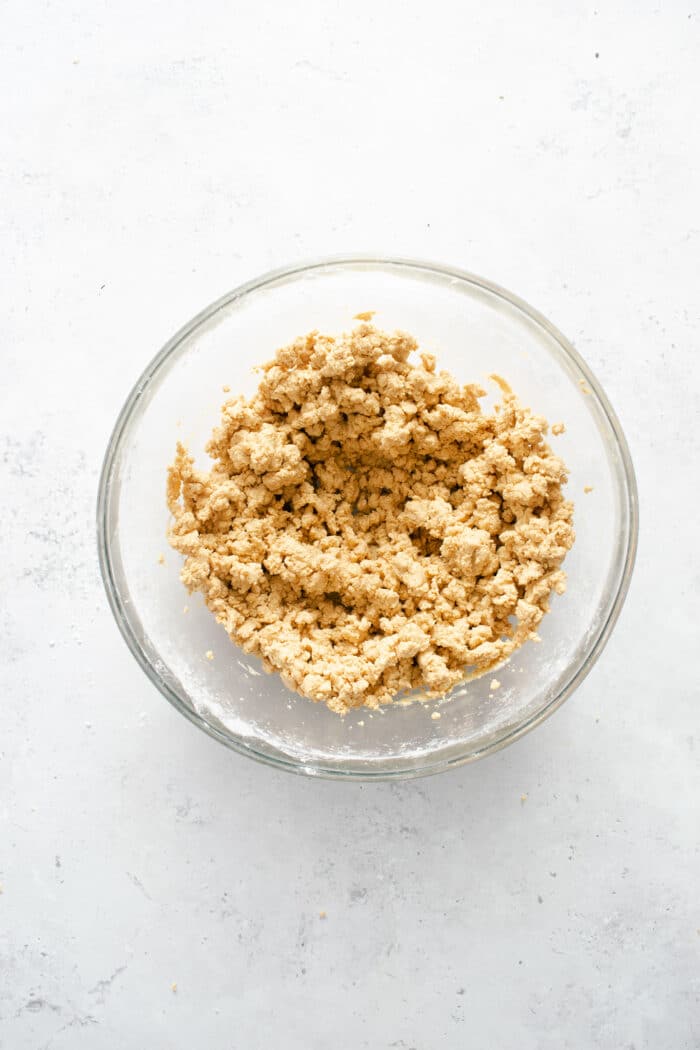 crumble textured peanut butter mixture in a bowl