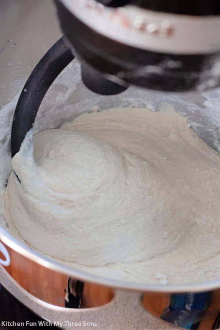 mixing soft pretzel dough in a KitchenAid mixer.