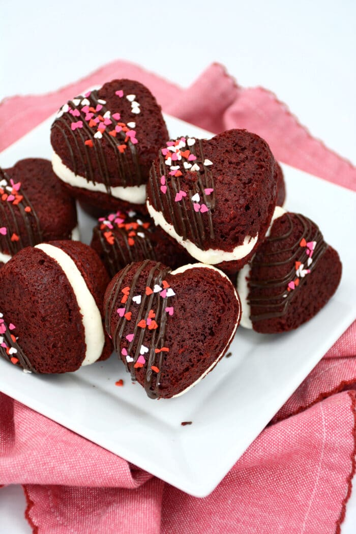 red velvet whoopie pies on a white plate