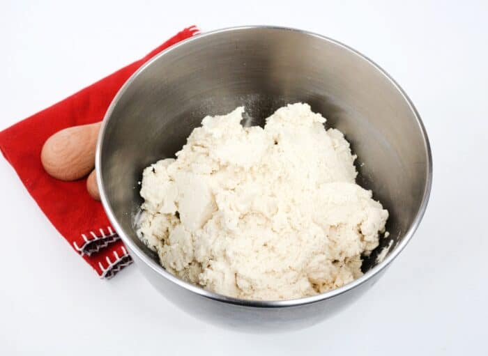 Combining the dough ingredients.