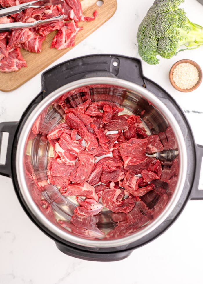 The cut beef in the Instant pot.
