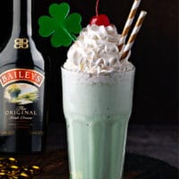 A delicious adult beverage for St. Patrick's Day. A Boozy Shamrock Shake is full of ice cream, mint and Bailey's Irish Cream.