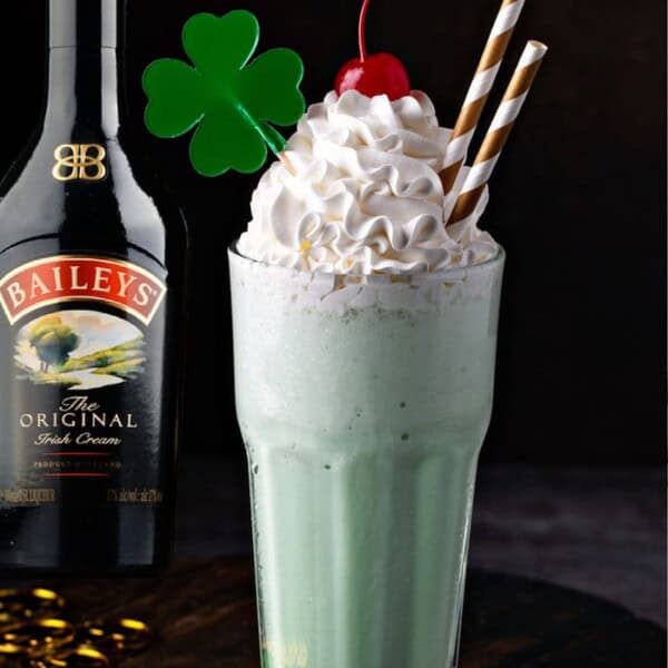A delicious adult beverage for St. Patrick's Day. A Boozy Shamrock Shake is full of ice cream, mint and Bailey's Irish Cream.
