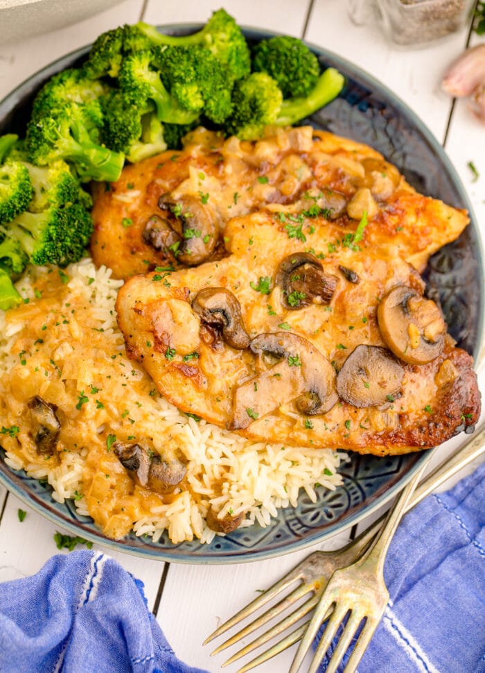 The Chicken Marsala on a grey plate.