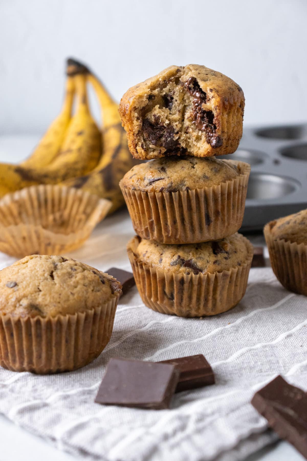 Banana Chocolate Chip Muffins Stacked on each other
