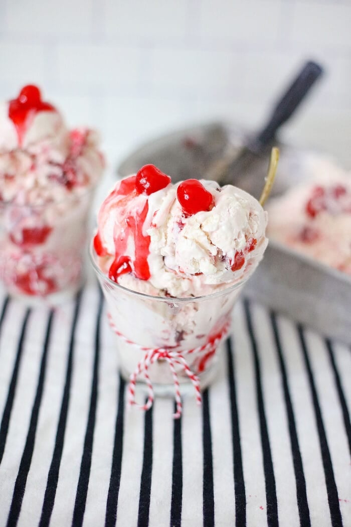 The No Churn Cherry Ice Cream with cherries on top.