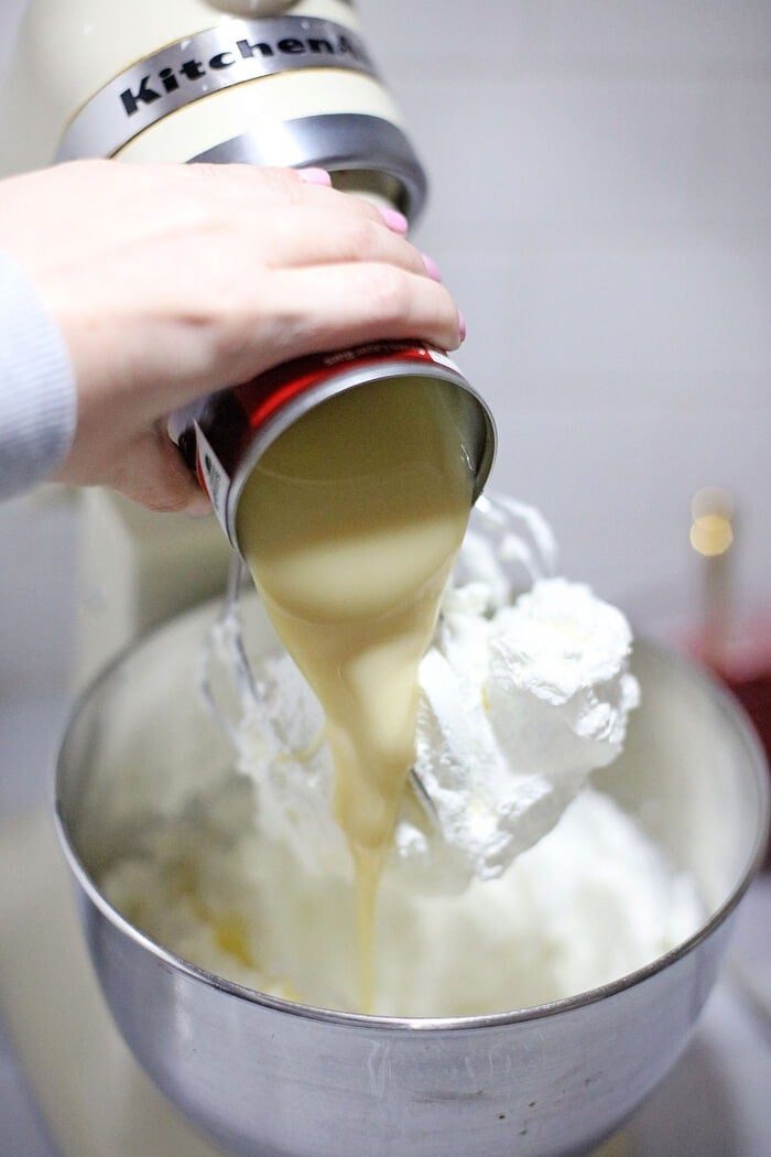 Adding in the sweetened condensed milk.