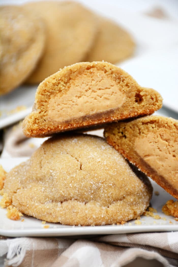 The Peanut Butter Stuffed Cookies on a table cloth.