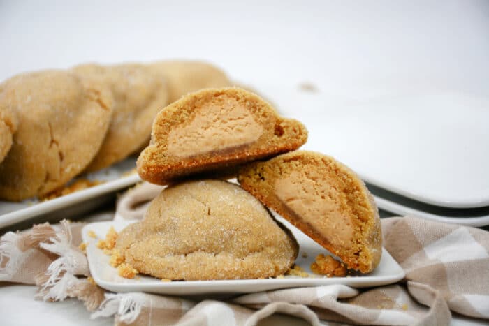 Peanut Butter Stuffed Cookies on a white table.