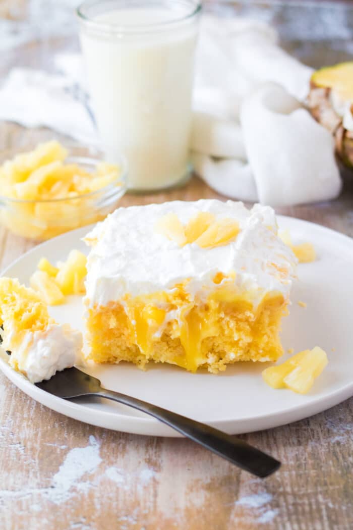Pineapple Poke Cake is a sweet, tasty and delicious pineapple-infused recipe with a creamy whipped topping. 