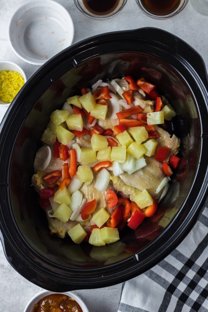 The veggies and chicken in the slow cooker.