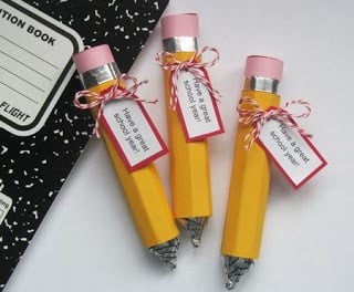Three giant pencil origami cases filled with Rolos and Chocolate Kisses