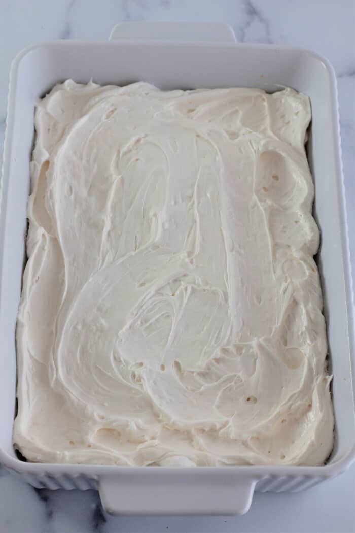 Whipped cream cheese spread in a cake pan