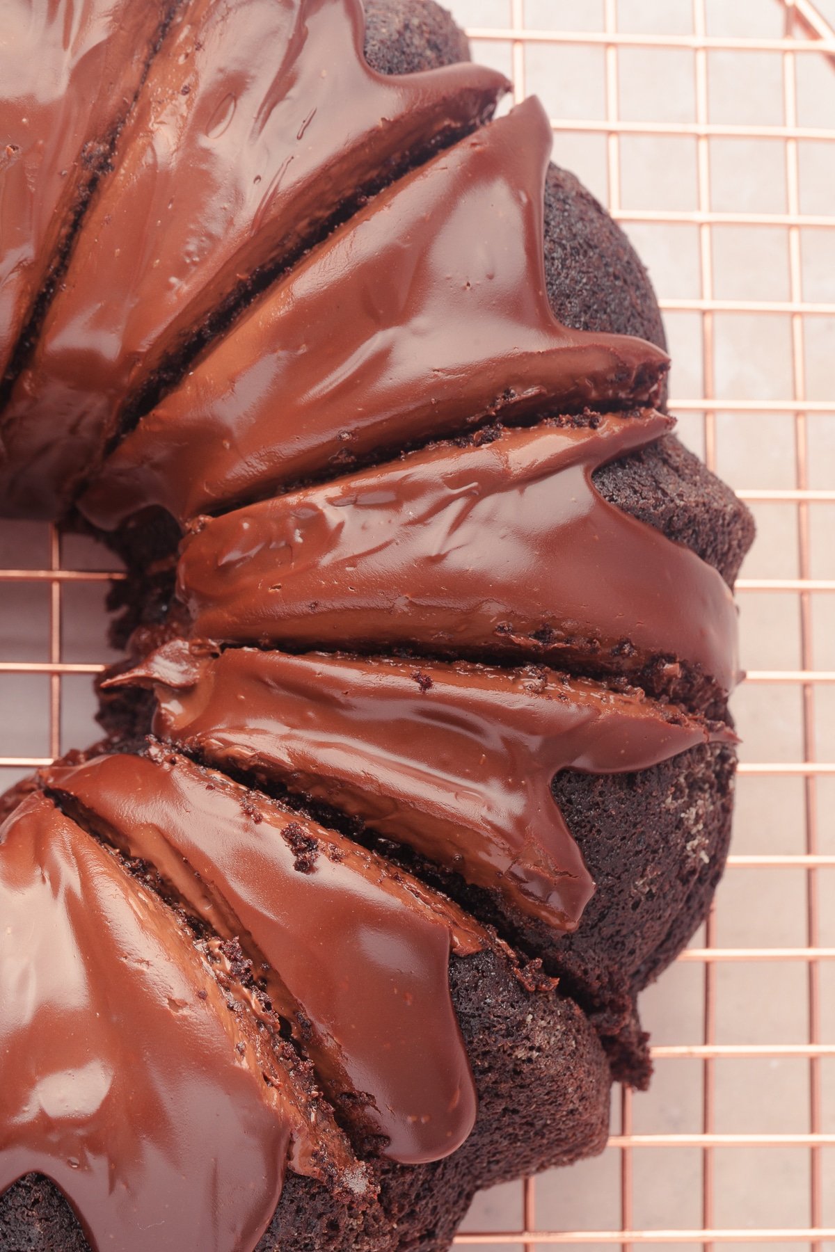 Close-up of a chocolate bundt cake cut into slices