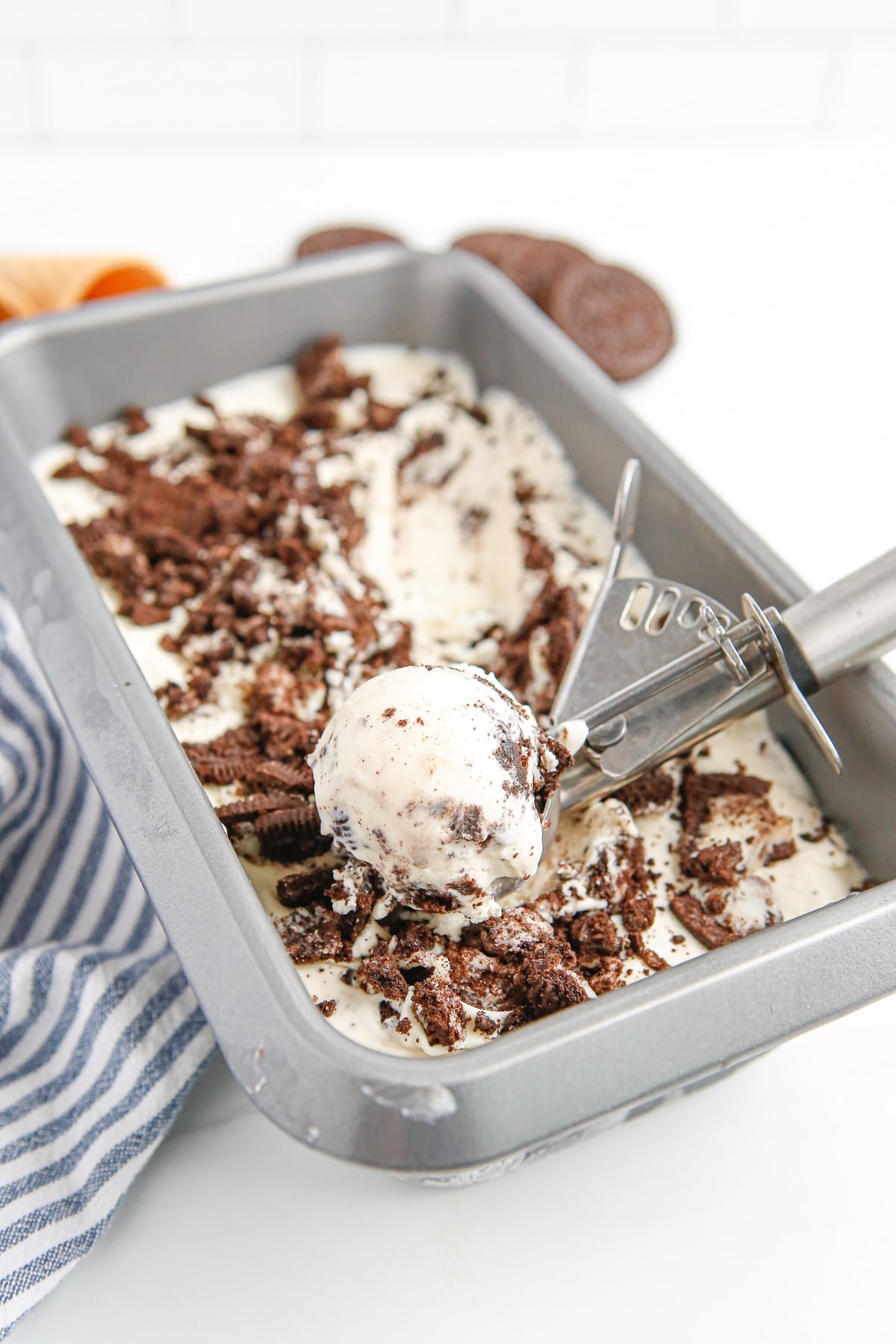 Scooping the ice cream.