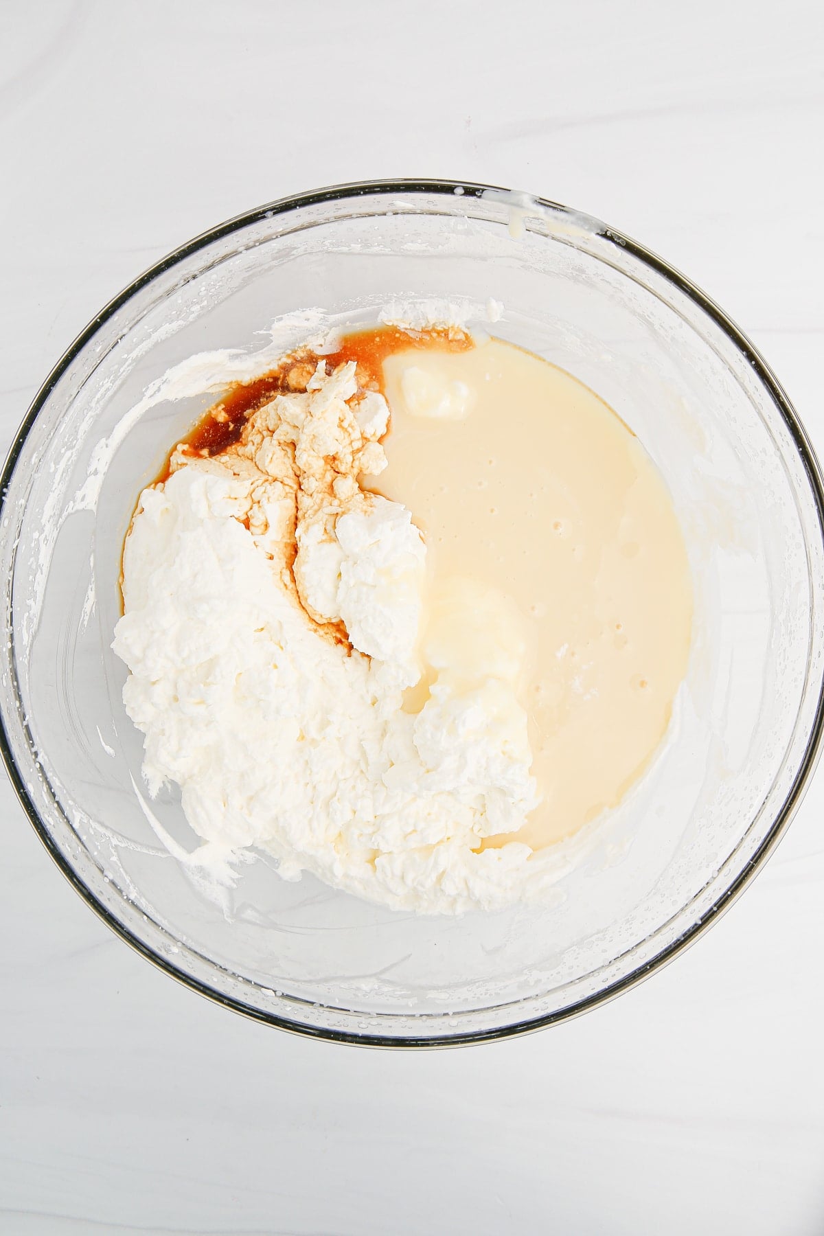 Mixing the ice cream ingredients.