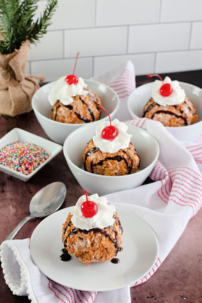 bowls of Fried Ice Cream with a side dish of colorful sprinkles.
