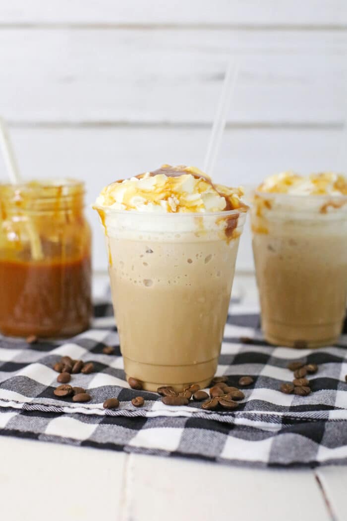 Frozen Caramel Coffee with mini caramel chips around the cup.