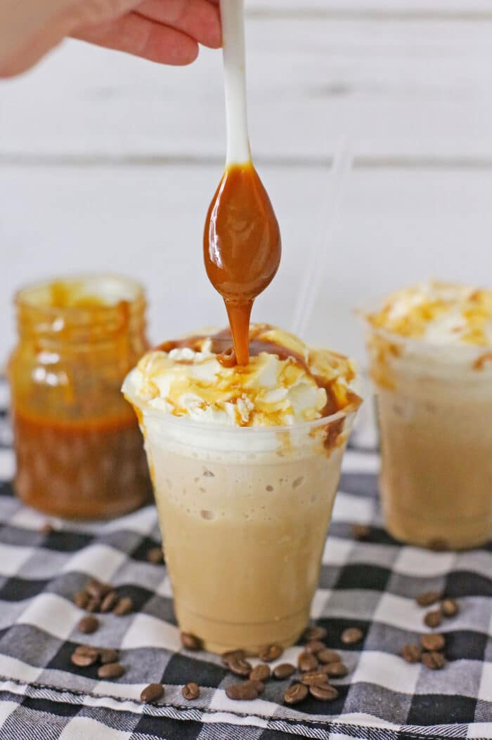 Adding the drizzle or Caramel to Frozen Coffee.