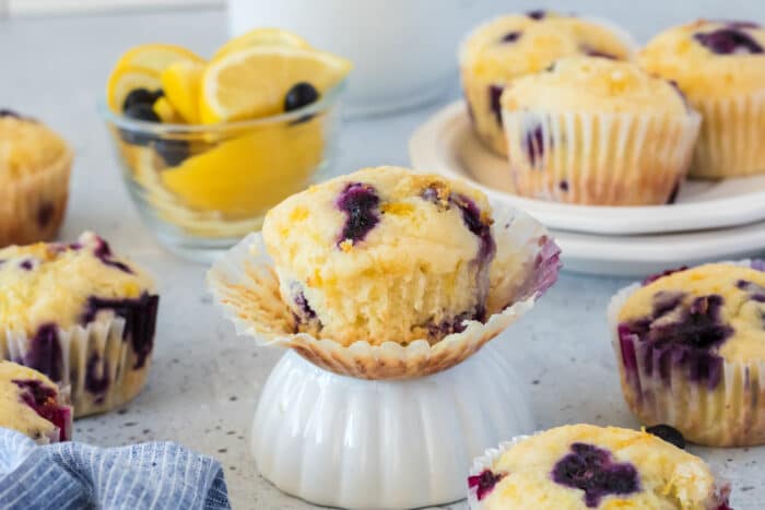 Lemon Blueberry Muffins with an open wrapper.