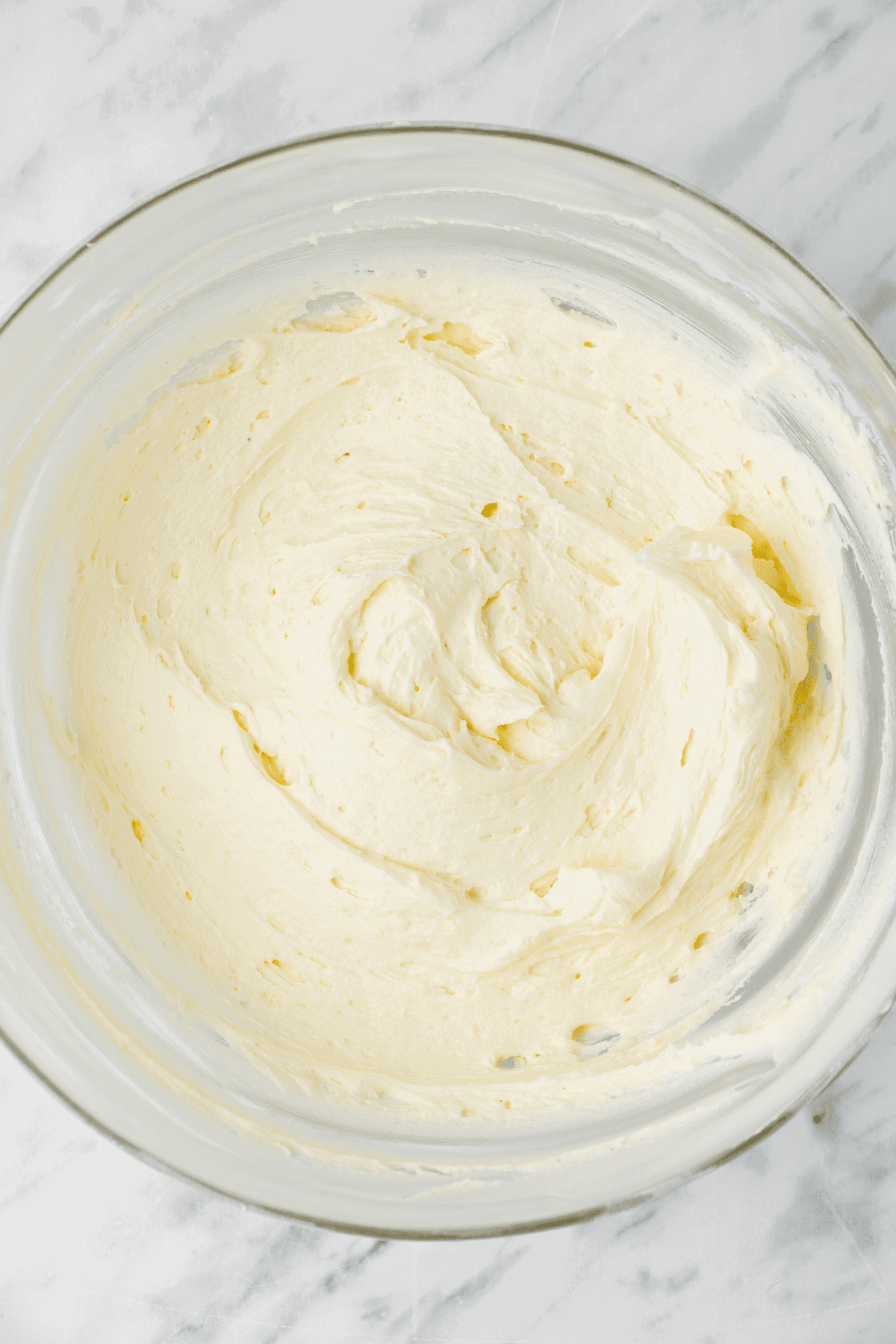 Lemon buttercream frosting in a mixing bowl