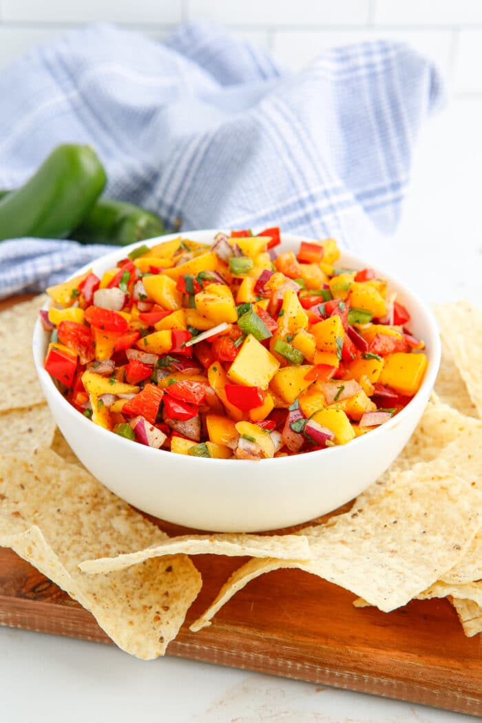 The Mango Salsa surrounded by tortilla chips.