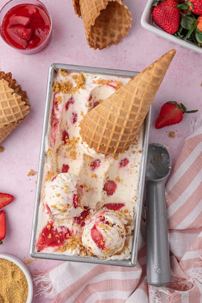 A cone in the Strawberry Cheesecake Ice Cream.