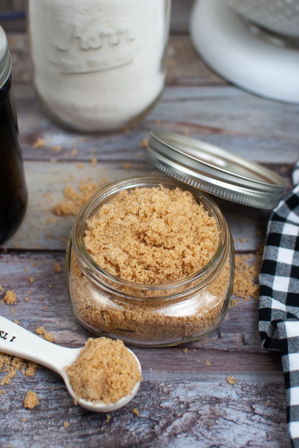 Brown Sugar Substitute in a glass jar with a Tablespoon