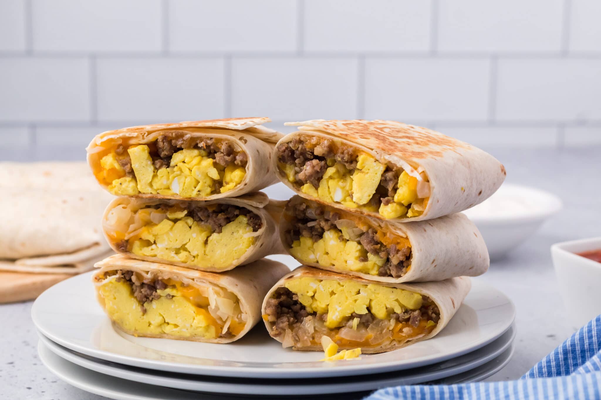 The Breakfast Burritos stacked on top of each other.