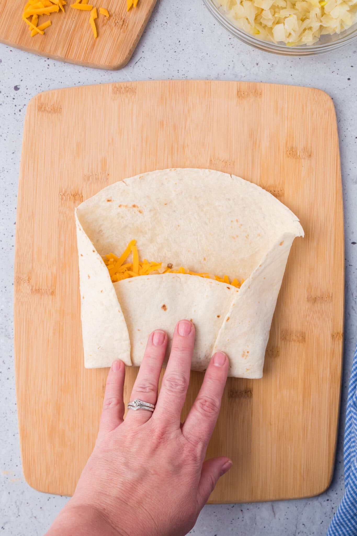Folding the burrito.