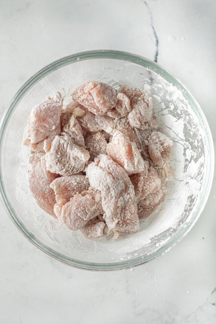 Tender, juicy pieces of chicken and toasted cashews are tossed in a sticky sweet-but-savory garlic sauce in this Cashew Chicken recipe. Chunks of chicken coated in cornstarch