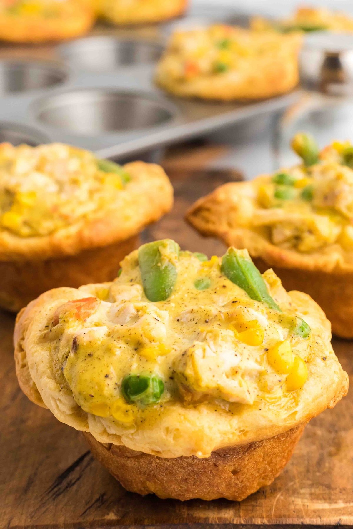 Angled overhead view of chicken pot pie muffins
