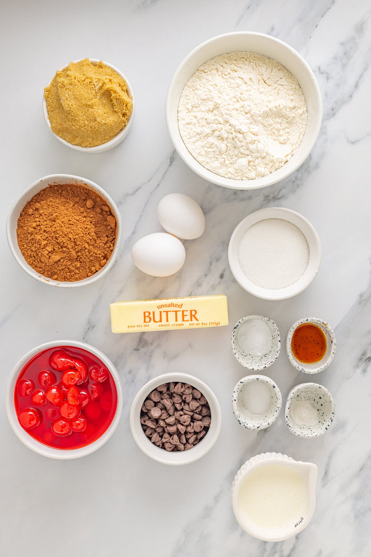 Overhead view of ingredients needed to make chocolate cherry cookies