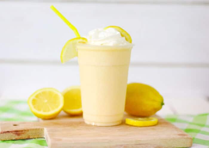 The Copycat Chic Fil A Frost Lemonade with a yellow straw.