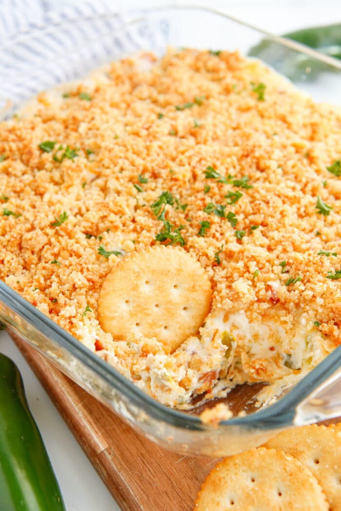 A cracker in the Jalapeno Popper Dip.
