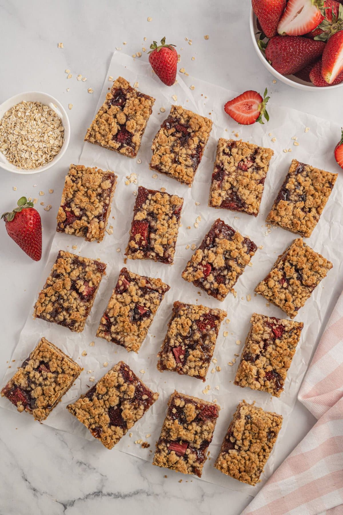 Strawberry Oatmeal Bars cut into squares.