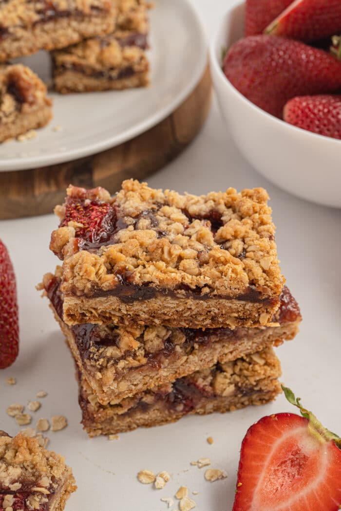 Strawberry Oatmeal Bars stacked on each other.