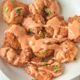 The shrimp coated in sauce.