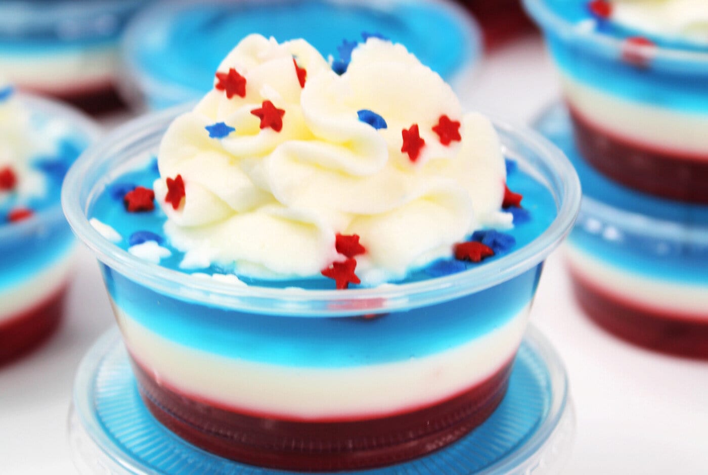 4th Of July Jello Shots topped with sprinkles.