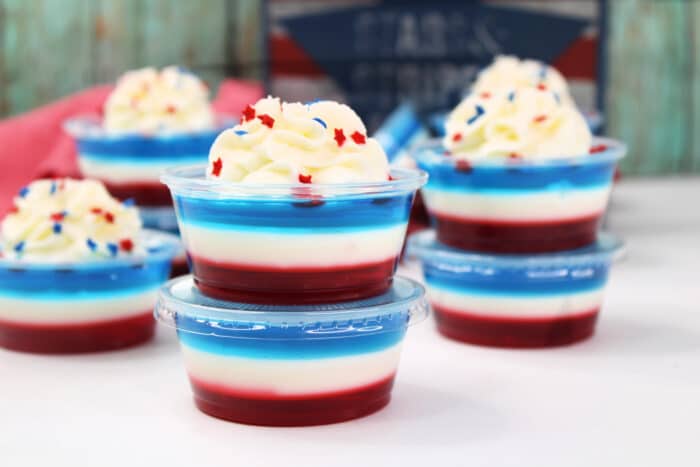 4th Of July Jello Shots topped with whipped cream.