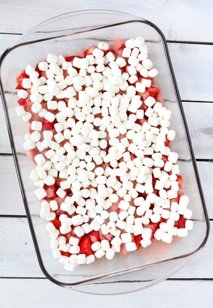 mini marshmallows on top of strawberry cake