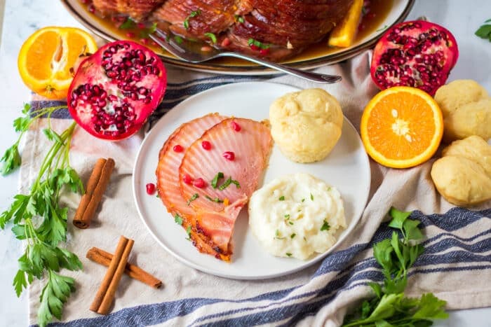 Christmas Ham on a white plate.