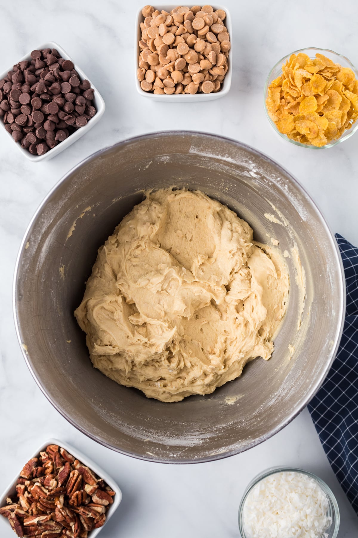 Oatmeal cookie dough in a mixing bowl