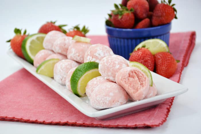 No-Bake Strawberry Truffles on a white tray.