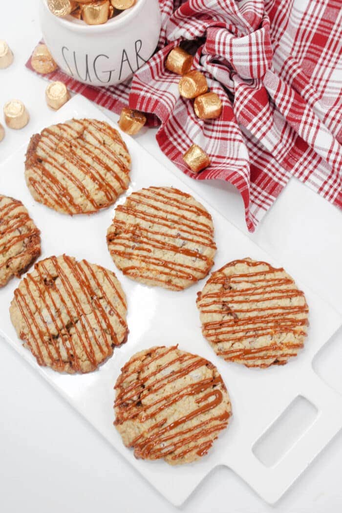 Oatmeal Rolo Cookies on a white board.