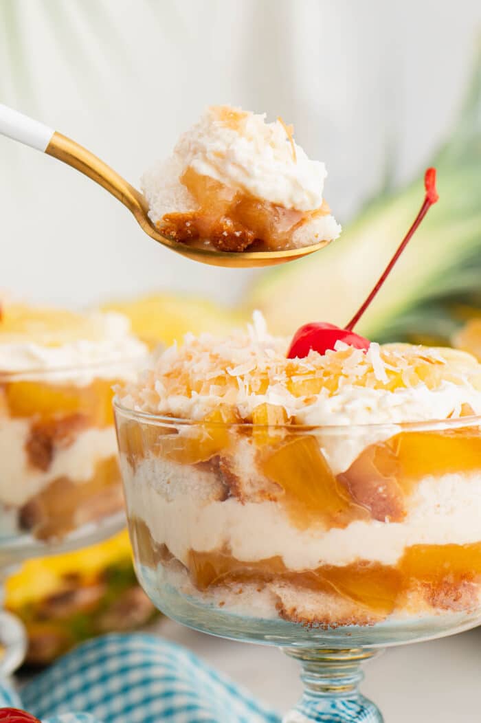 A fork eating some of the Pineapple Trifle.