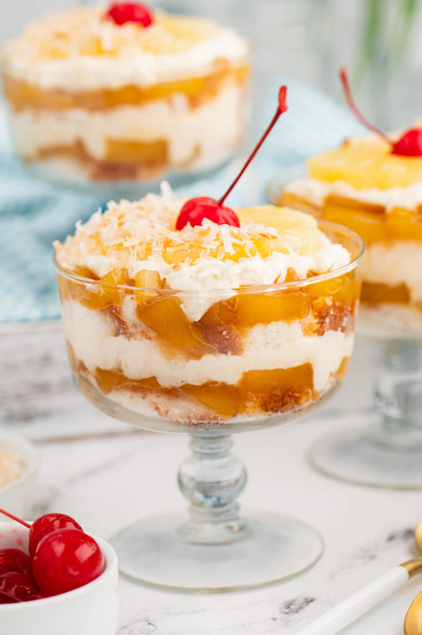 Pineapple Trifle with a cherry on top.